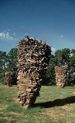 Cameron Gregg
365 Ways to Bear a Burden #3, 1990 - 1991
moss rocks, sticks, adobe, approx: 82 x 59 x 53 inches