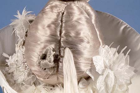 Millie Wilson
White Girl (Detail), 1995
synthetic hair, satin, feathers, fox tail, pottery, etc.