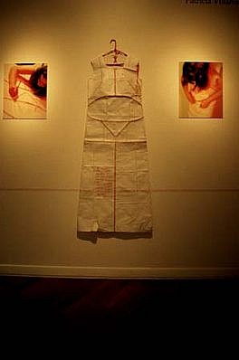 Patricia Villanueva Mavila
Dario Olvido (Daily Forgets), 2000
dress made of copybook pages
The dress has been written all over in a period of one year and treated as a kind of diary. Then it was completely erased, while being worn by the artist. Treated as a kind of amnesic ritual, these writing and erasing processes were recorded by a series o