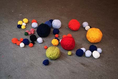 Katie Holten
Lines Made While Getting Here, 2003
crochet wool, dimensions variable - each crochet ball corresponds to the length of the journey taken on public transportation while making the piece