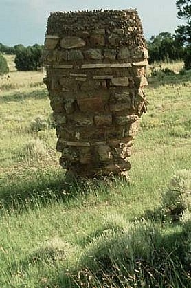 Cameron Gregg
365 Ways to Bear a Burden #3, 1990 - 1991
moss rocks, sticks, adobe, approx: 90 x 64 x 64 inches