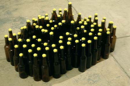 Tony Feher
Untitled (Somethin' Funky), 1997
brown glass bottles, yellow marbles, 16 1/4 x 36 x 22 inches