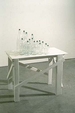 Tony Feher
Untitled, 1997
15 bottles and marbles, wood and paint, 37 x 32 x 17 3/4 inches