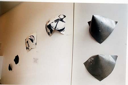 Rebecca Forster
Molten Mountain, 2000
etched and beaten zinc, sizes circa 30 x 65 x 55 cmpaper volcanoes 75 x 70 x 20 cmfrisbees, steel 40 x 35 x 8 cm
zinc volcanoes