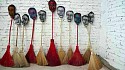 Marisa Boullosa, Cotidianamente...(Everyday...)
2009, installation, brooms, linocut print on cotton, red paint