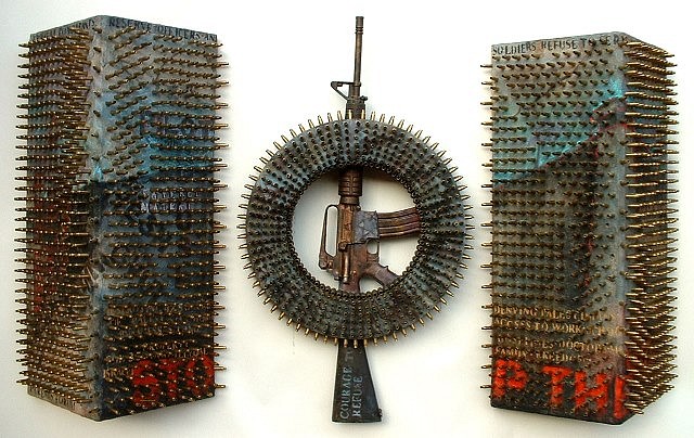 Suzanne Klotz
Cracks in the Wall, 2005
wood, bullet shells, replica M-16 rifle, 77 x 47 x 16 in.