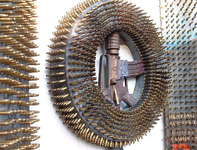 Suzanne Klotz
Cracks in the Wall (detail), 2005
wood, bullet shells, replica M-16 rifle, 77 x 47 x 16 in.