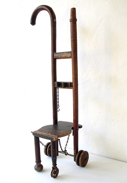 Janet Orselli
Wheel Chair, 2006
cane, fishing rod, wheels, chain, wood, metal, 25 x 7 x 7 in.