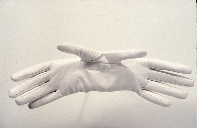 Claire Watson
As It Were, 2003
altered leather glove, sawdust, wood, wire, 4 x 12 x 3 in.