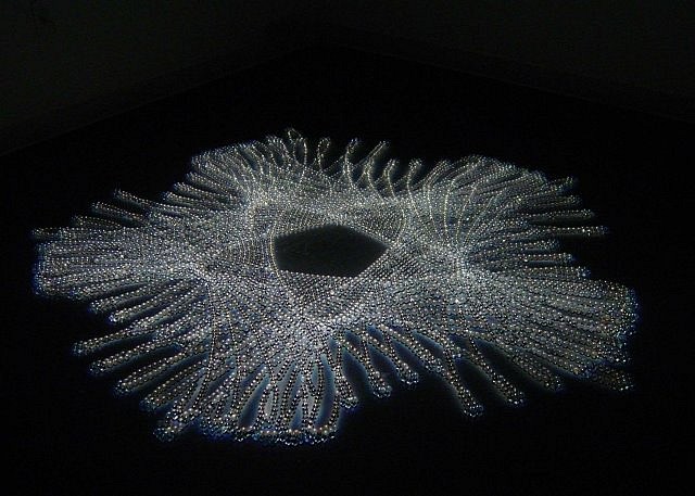 Wendy Wischer
Coming to Me in Waves, 2006
projected light, gobo pattern and projected marbles, 90 x 48 in.