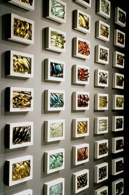 Julie Mihalisin & Philip Walling
Collaborative Effort, 1998
glass, concrete, metal, 45 wall pieces: 5.5 x 7.5 inches each