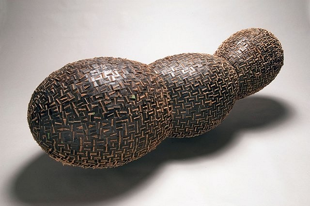 Minoru Ohira
Fission, 2005
burning cut and snapped white oak on wood form, 24 x 26 x 75 in.