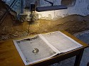Lisa Bateman, Next Year
2012-2014, installation - offset print on newsprint broadsheet 141 pages, reading magnifier, chain, furniture