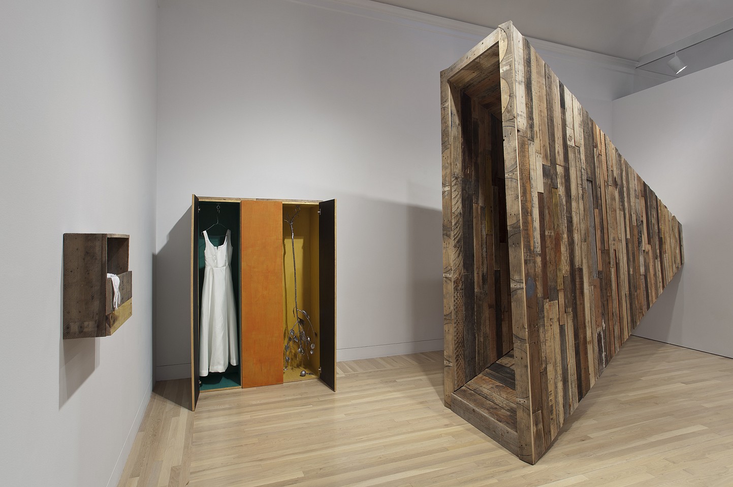 Liz Glynn
Anonymous Needs and Desires (Gaza/Giza) (R), (Passage Gaza/Giza) (L), 2012
Reclaimed forklift pallet stock, wood with casein paint, cast lead, reinforced Kevlar, ballistic nylon, resin, Cabinet 72 x 48 x 18 inches
Tunnel 118 x 38 x 171 inches