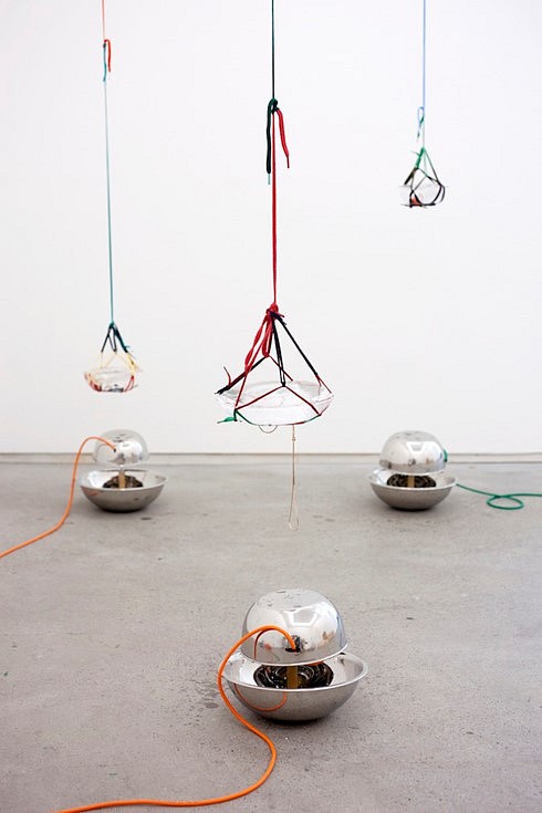 Aki Sasamoto
Talking in Circles in Talking, 2013
stainless steel mixing bowl, ice picks, handmade contact microphones, sound mixer, gaff tape, zip tie, plastic stoppers, shoelaces, small found objects, ice blocks and melting sound file, 4 x 4 x 8 feet