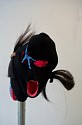 Natalie Ball, Untitled (hawk talon)
2018, balaclava, hawk foot, boxing glove, sinew/linen thread, Nike Air Max shoes, beaded barrettes, rubber bands, horse hair, galvanized pipe with floor flange