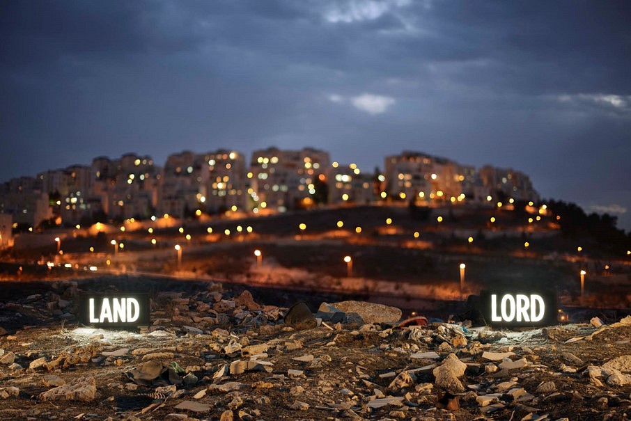 Shimon Attie
LAND LORD, 2014
Two on-location custom made light boxes, looking onto Israeli settlement Har Homa from Palestine Village Umm Tuba, annexed by Israel in 1967, 15 x 48 in.