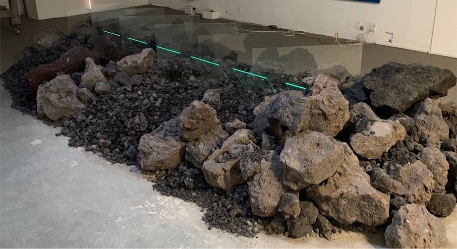 Laddie John Dill
Volcanic Light Plains, 1969 (executed in studio 2018 - picture)
volcanic rocks, plate glass, argon with mercury tube, 40 x 240 x 72 inches (variable architectural specific)