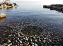 Strijdom van der Merwe, Clearing a stone circle, Neuchatel, Switzerland
2019, natural stone/lake