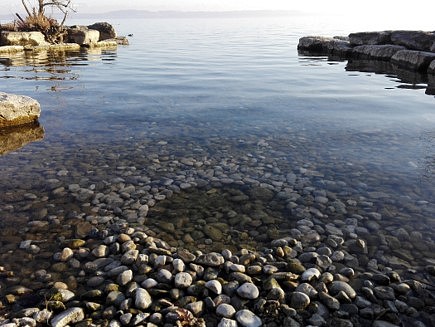 Strijdom van der Merwe
Clearing a stone circle, Neuchatel, Switzerland, 2019
natural stone/lake, 2 x 2 meters