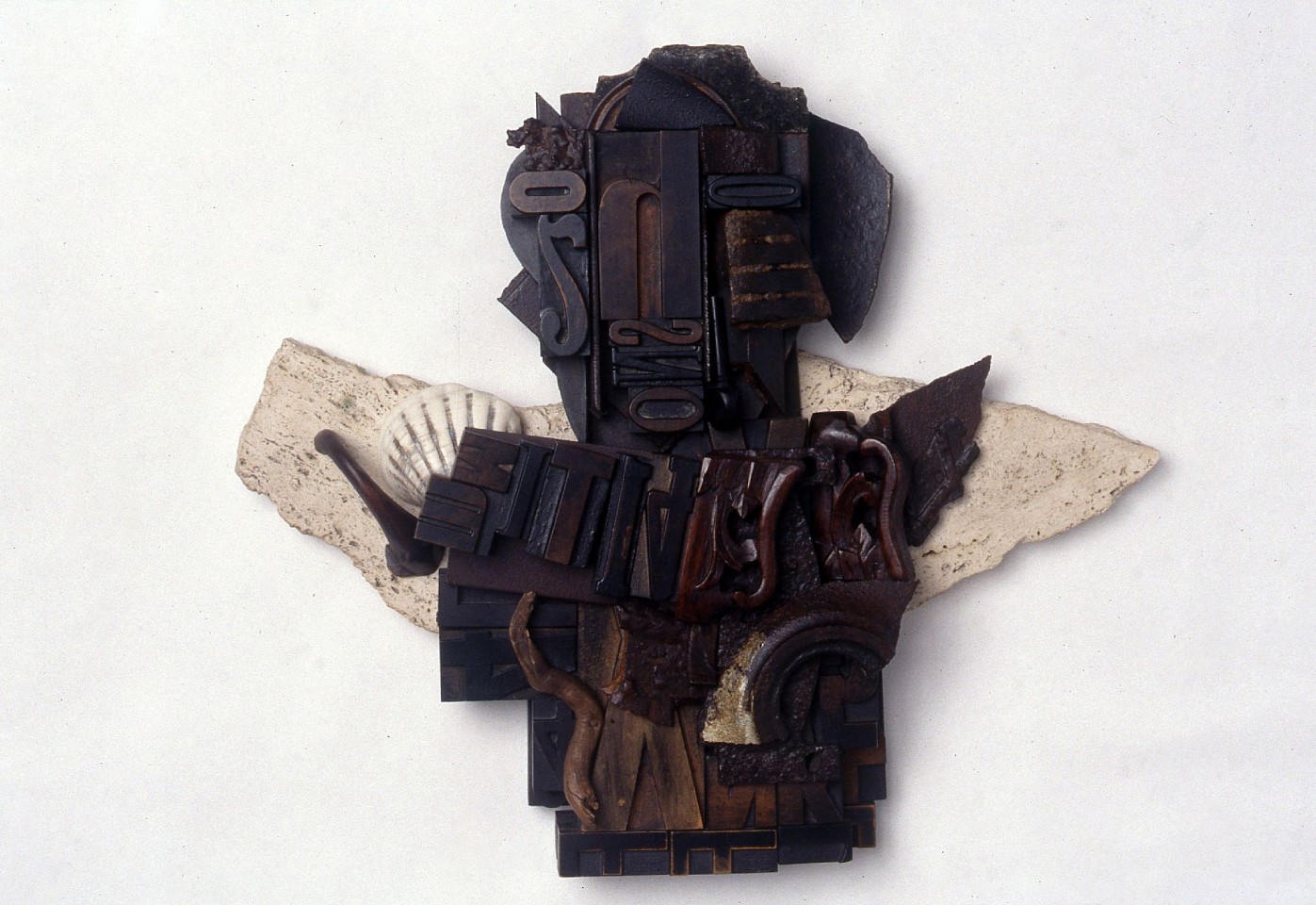 John Keys
Dance Before the Mountain, 1991
mixed media ( wood, typography, granite, shell), 15 1/4 x 17 1/2 x 3 in.
