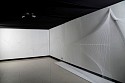 Parul Gupta, Notes on Movement Site Specific Drawing in Space #2
2016, thread, needles, nails, permanent marker, glue on wall and two lights on kinetic structure on the ceiling